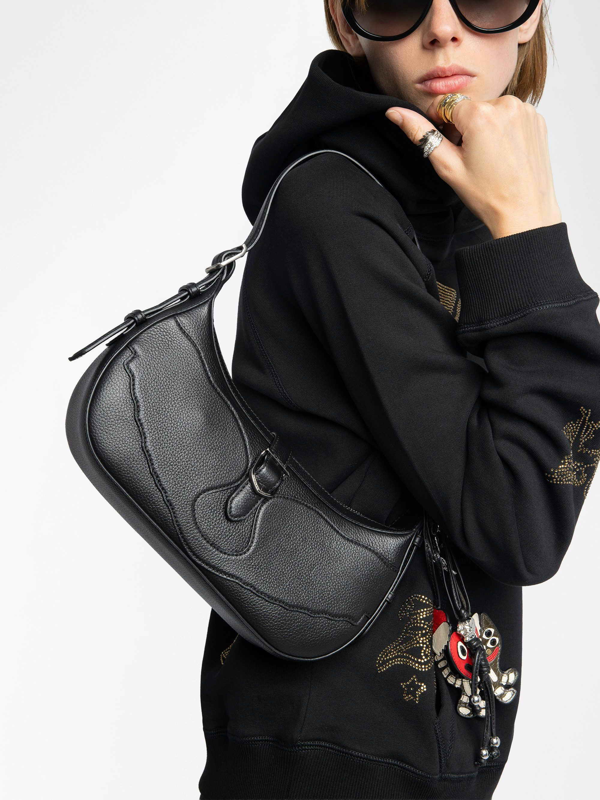 Moonrise Bag - Baguette bag in grained leather with signature wings.